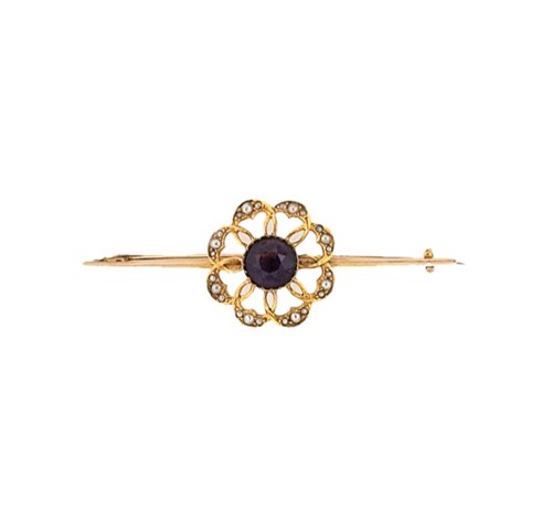 Lot 65 - An amethyst and split pearl flower brooch