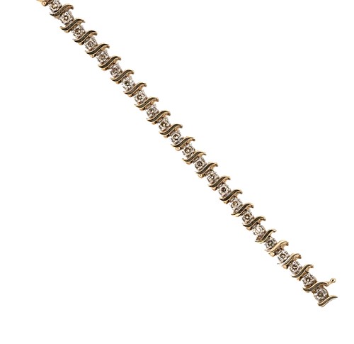 Lot 115 - A diamond set line bracelet