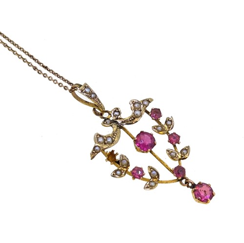 Lot 25 - A pink paste and split pearl pendant and chain