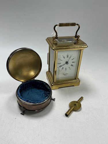 Lot 173 - A carriage clock by Bornand Freres , together...