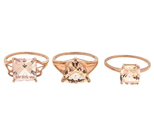 Lot 26 - A group of three 9ct rose gold morganite dress rings