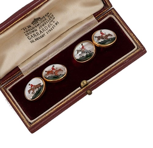 Lot 21 - Garrard - A pair of reverse painted intaglio cufflinks