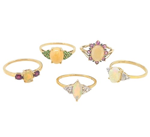 Lot 31 - A group of five 9ct yellow gold opal dress rings