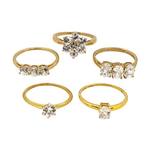 Lot 32 - A group of five 9ct yellow gold zircon dress rings