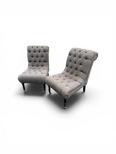 Lot 383 - A pair of reproduction slipper chairs with...