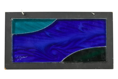 Lot 15 - Jonathan Soper (contemporary), a carved stained glass panel