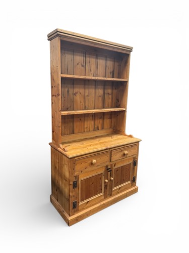 Lot 352 - A late 19th century pine dresser in two...