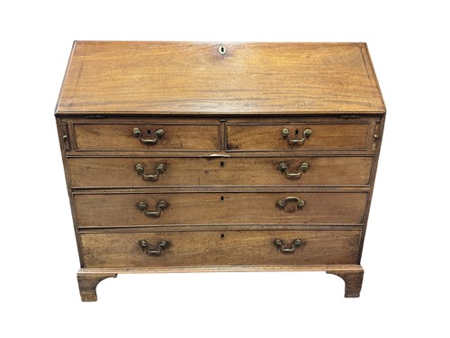 Lot 634 - A 19th century mahogany bureau