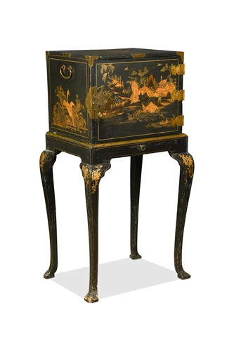 Lot 493 - A Japanese style black lacquered cabinet on stand, 18th century
