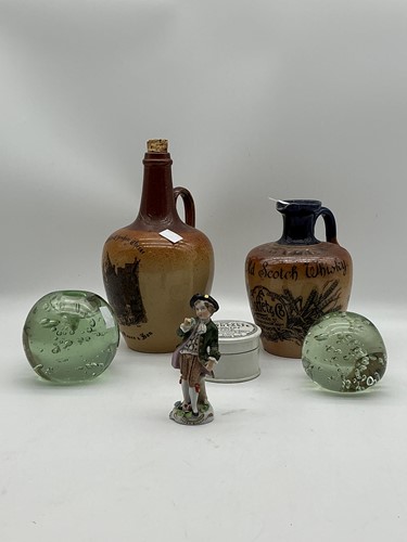 Lot 44 - Two named Doulton stoneware spirit jugs, two...