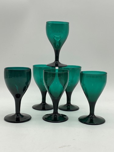 Lot 20 - A set of six green glasses, 12.5cm high (6)