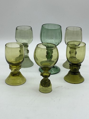 Lot 19 - Six various green glass hock glasses, 15cm and...