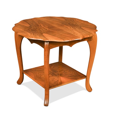 Lot 219 - An Art Deco figured walnut occasional table, circa 1940