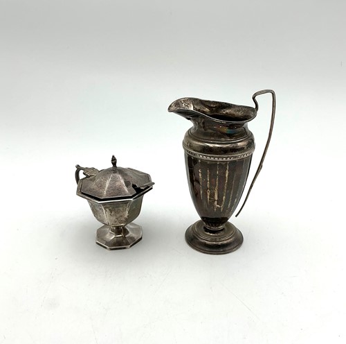 Lot 8 - A silver cream jug, together with a silver salt