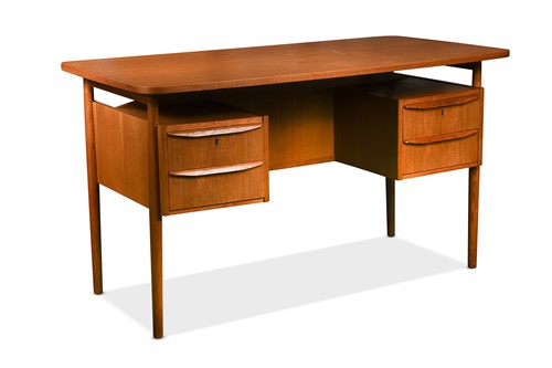 Lot 251 - Gunnar Nielsen Tibergaard, a Danish teak desk, circa 1960s