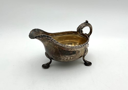 Lot 18 - An Edwardian silver sauceboat