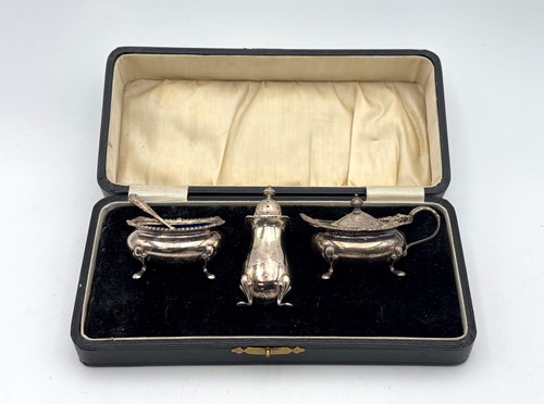 Lot 31 - A cased three piece condiment set