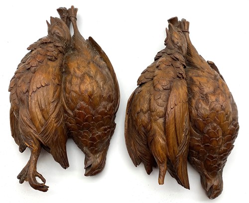 Lot 117 - A pair of carved wood partridges, feet missing...