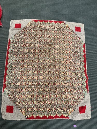 Lot 476 - An early 20th century woollen rug with deep...