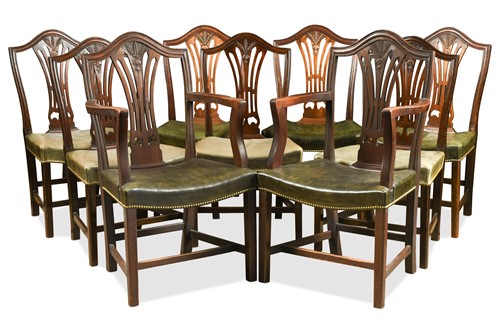 Lot 510 - A set of twelve Hepplewhite style mahogany dining chairs, 19th century