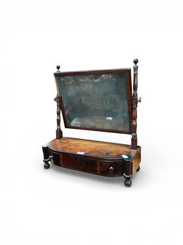 Lot 453 - A Regency bow fronted mahogany dressing table...