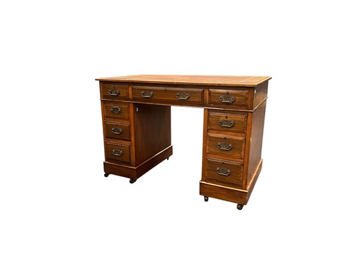 Lot 652 - A stained wood pedestal desk, 20th century