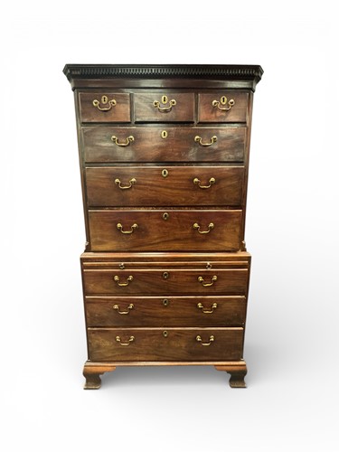 Lot 426 - A George III mahogany chest on chest, on ogee...