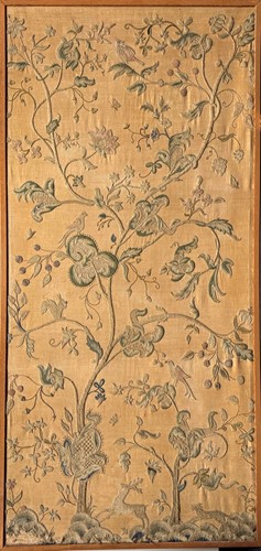 Lot 449 - A large framed crewelwork of a forest scene...