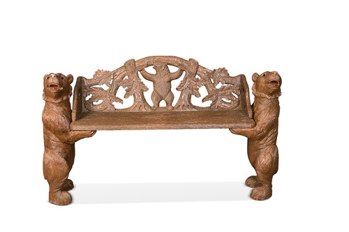 Lot 123 - A Black Forest carved wooden bench