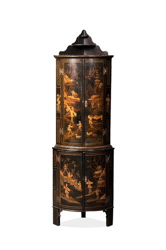 Lot 154 - A George III black lacquered floor standing bowfront corner cupboard