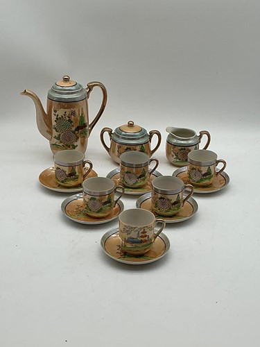 Lot 32 - A 20th century Japanese coffee set with...