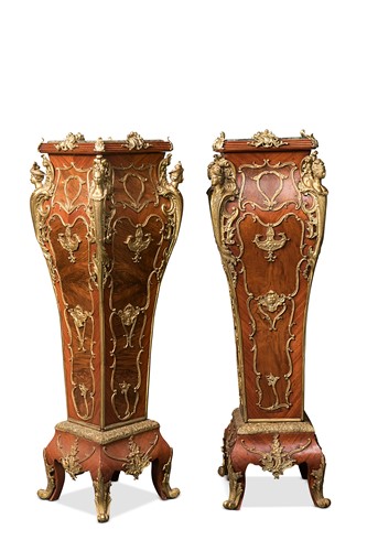 Lot 136 - A pair of Louis XV style gilt metal mounted kingwood and walnut pedestals, early 20th century
