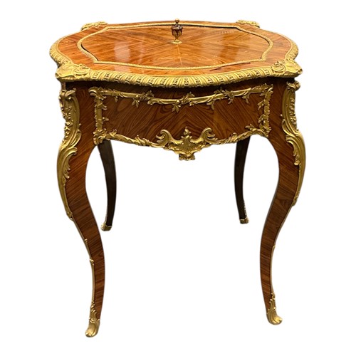 Lot 131 - A French kingwood and gilt metal mounted jardiniere table, circa 1900