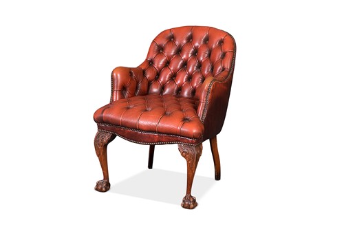 Lot 121 - A George II style red leather upholstered chair