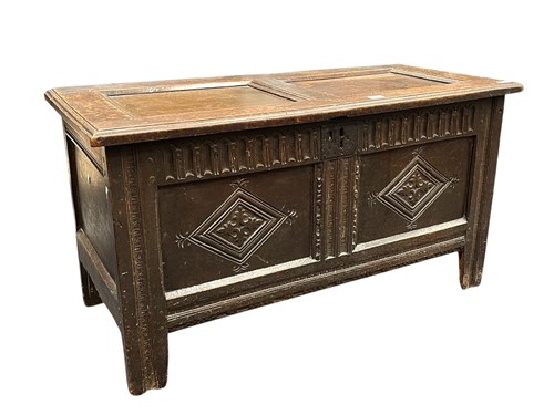 Lot 416 - A 17th century oak coffer, the two panelled...