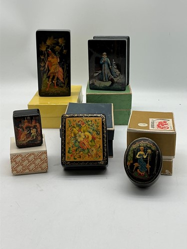 Lot 44 - Five Russian lacquer boxes painted with...