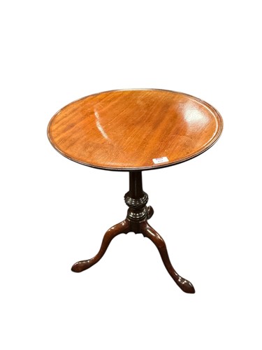Lot 414 - A George III style mahogany circular top...