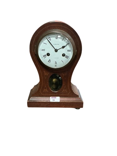 Lot 96 - A mahogany balloon case mantel clock with...