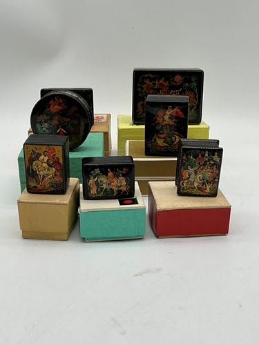 Lot 47 - Seven Russian lacquer boxes painted with...