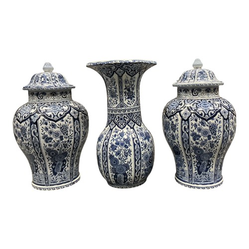 Lot 36 - A chimneypiece blue and white garniture, possibly Boch, 19th century