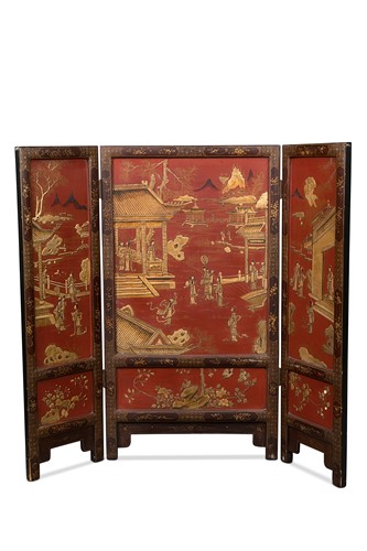 Lot 55 - A Chinese red lacquered three-fold screen, circa 1900