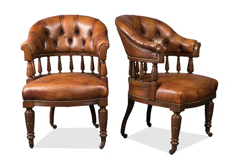 Lot 146 - A pair of leather upholstered mahogany armchairs, circa 1900