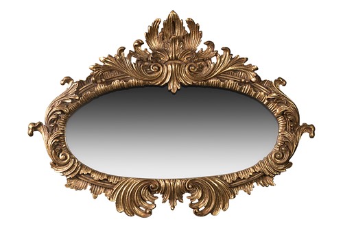 Lot 143 - A moulded gilt wall mirror
