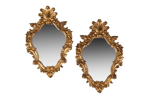 Lot 126 - A pair of Rococo style giltwood mirrors, modern
