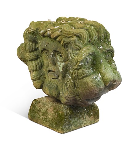 Lot 711 - A double headed carved stone garden finial