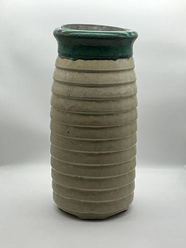 Lot 72 - A large green and white glazed ceramic planter,...