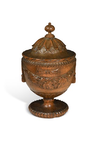 Lot 636 - A Neo-classical walnut urn and cover, late 18th century