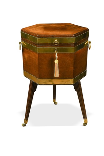 Lot 538 - A George III mahogany and brass-bound cellarette