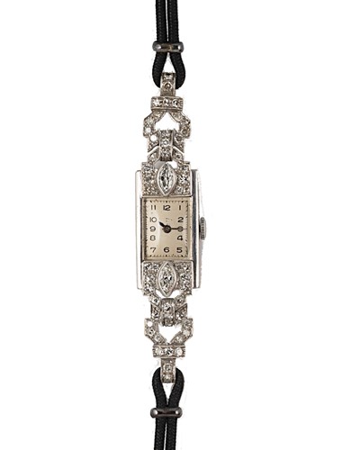 Lot 252 - An Art Deco diamond set cocktail wristwatch