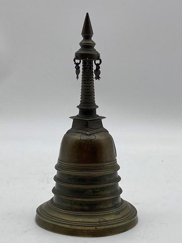 Lot 130 - A 19th century bronze bell in the form of a...